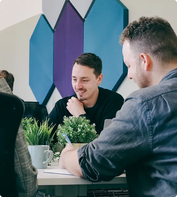 The Darwin team around a table